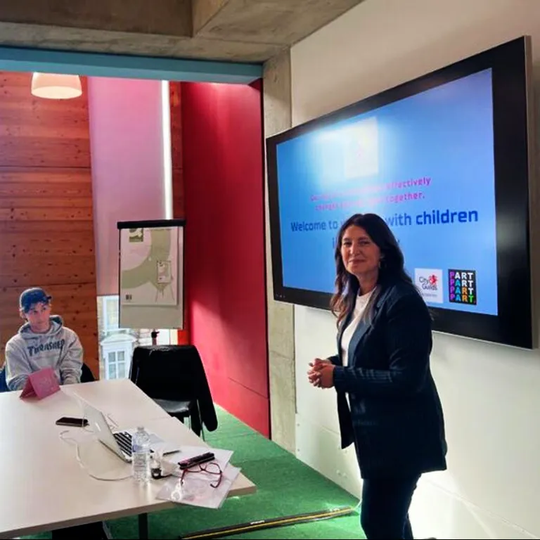 Arlene De Cruz giving training